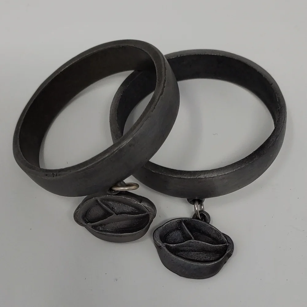 VINTAGE TUPPERWARE PEWTER METAL NAPKIN RINGS SET OF 8 TABLESCAPE COLLECTIBLE